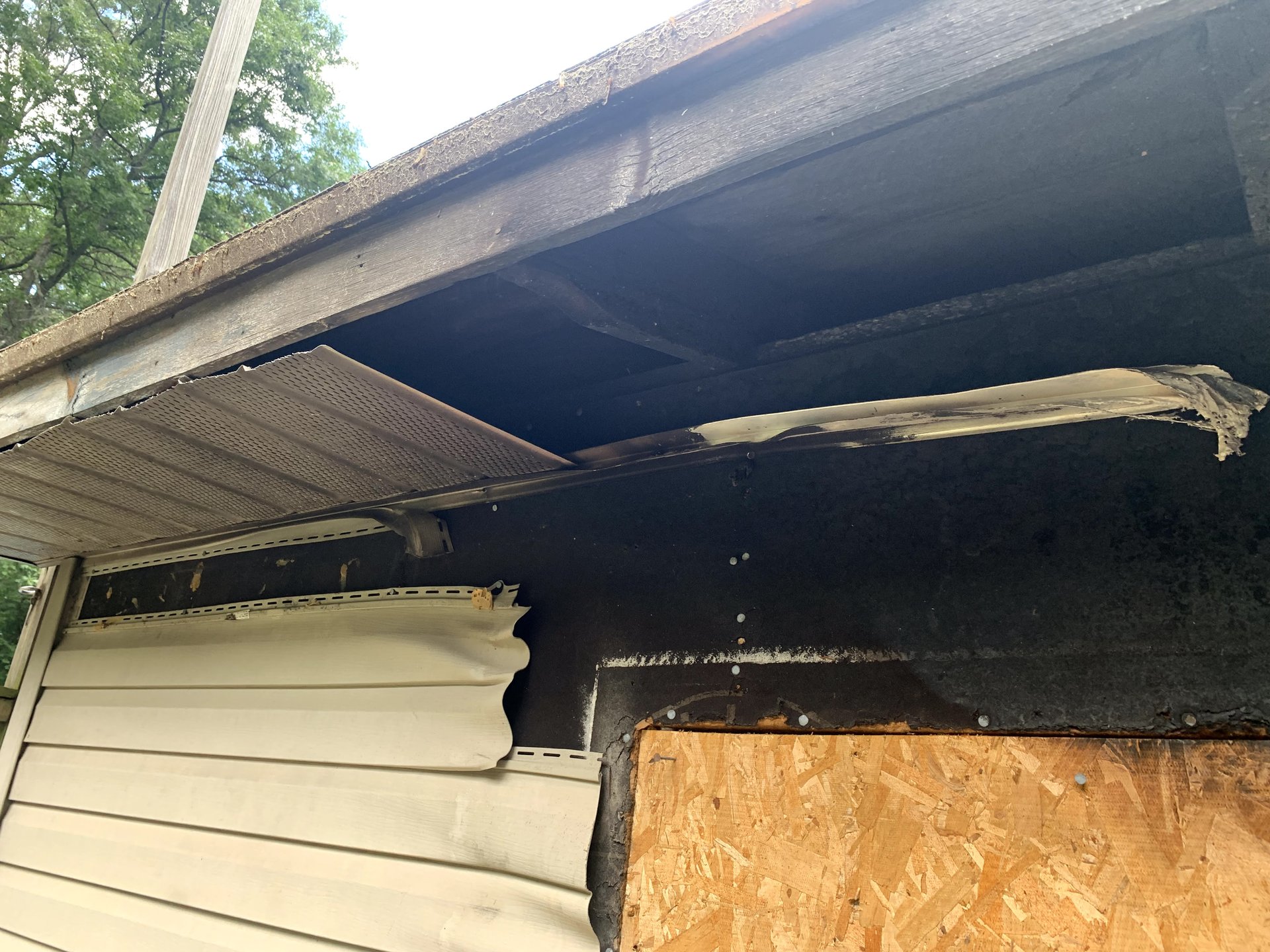 Storm damage repair on soffit and fascia